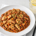 Comida a domicilio - Ragú de pollo guisado con verduras y tomillo