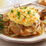 Comida a domicilio - Contramuslo gratinado con cebolla y alioli