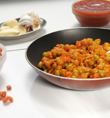 Guisantes con tomate y jamón de La Grosella