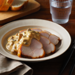 Comida a domicilio - Jamón asado con salsa de setas