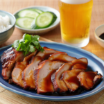 Comida a domicilio - Aguja de cerdo marinada al estilo Muu Daeng tailandés