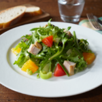 Comida a domicilio - Ensalada verde con pavo y naranja