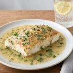 Comida a domicilio - Merluza con salsa marinera