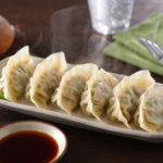 Comida a domicilio - Gyozas de cerdo con verduras