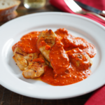 Comida a domicilio - Solomillos de pollo con salsa de pimientos del piquillo