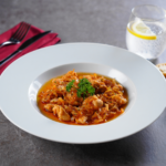 Comida a domicilio - Mollejas de pollo encebolladas