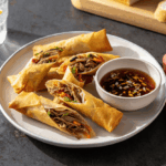 Comida a domicilio - Rollitos orientales con carne mechada