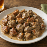 Comida a domicilio - Puntas de solomillo de cerdo con salsa de pimienta verde