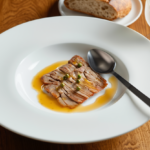 Comida a domicilio - Secreto con salsa de pimienta verde