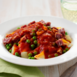 Comida a domicilio - Guisantes con jamón, huevo y tomate