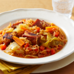 Comida a domicilio - Repollo y chucrut con costillas ahumadas
