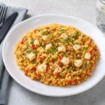 Comida a domicilio - Arroz de merluza con verduras y ajetes tiernos