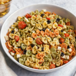 Comida a domicilio - Pasta tricolor vegetariana con tomate y mozzarella